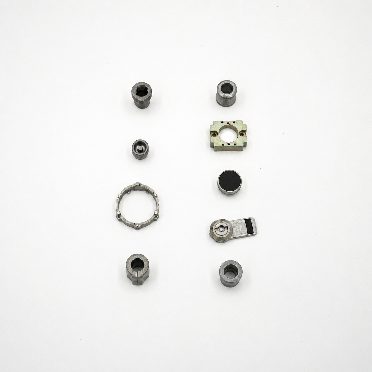 Precision zinc die cast panel lock and panel switch components manufactured by SNAA Products for electrical control panels, industrial enclosures, and switchgear applications.