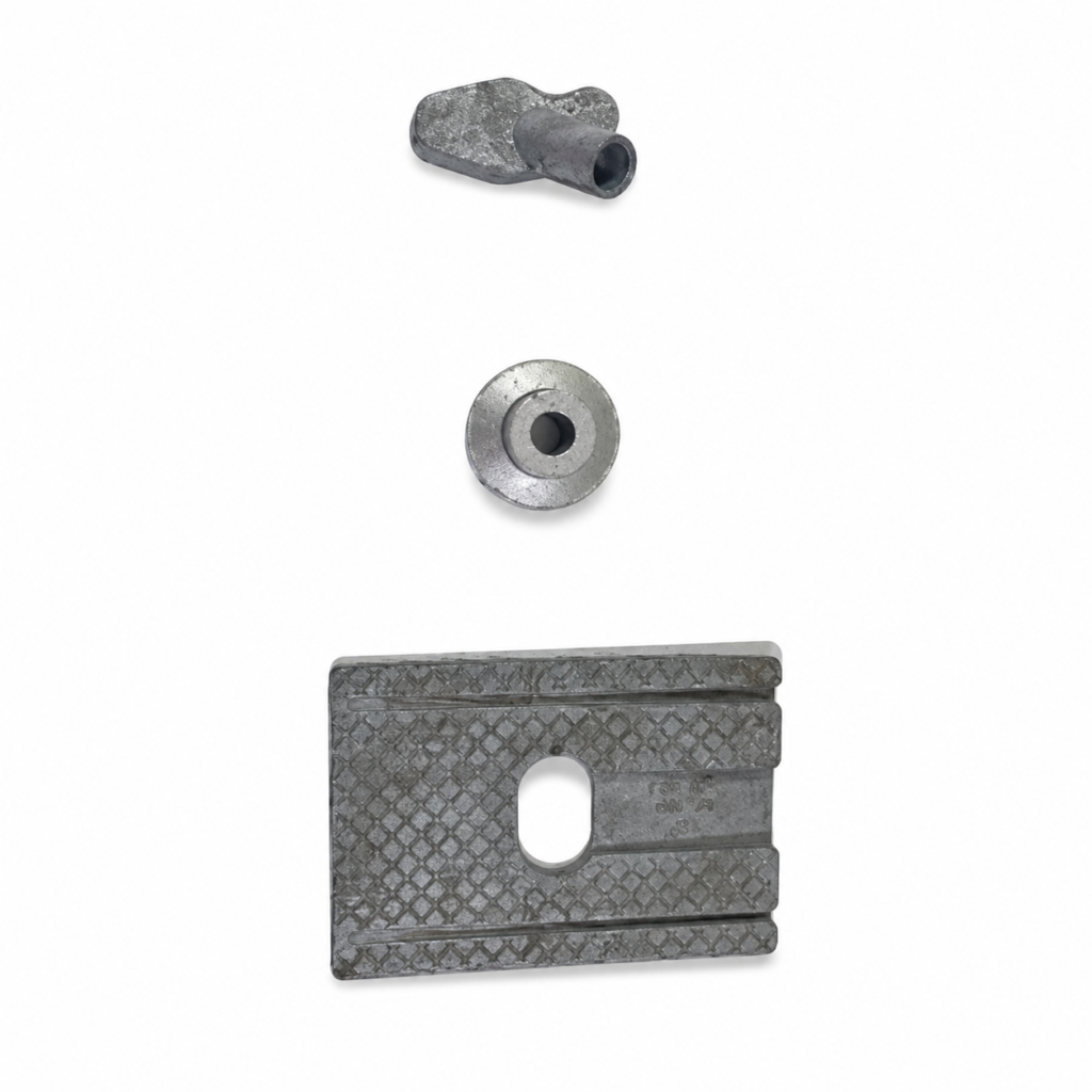 Precision zinc die cast sewing machine linkage components, pulley spacers, bushings, and mounting plates manufactured by SNAA Products for industrial sewing machines and textile machinery applications.